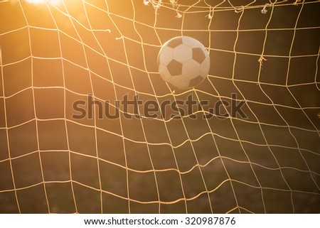 Soccer ball in the strong sunlight conditions.