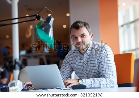 startup business, software developer working on computer at modern office Royalty-Free Stock Photo #321052196