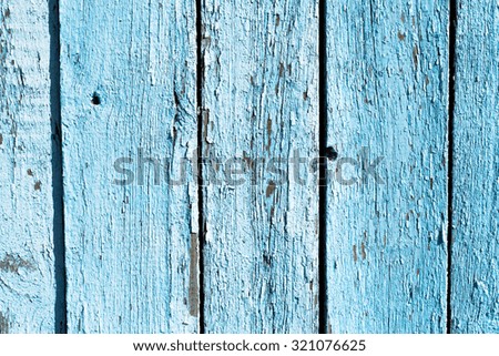old wooden fence with blue paint