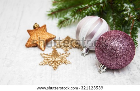 christmas decoration baubles and a branch of pine tree