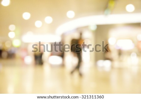 Lights of duty free shop in airport - defocused blured background