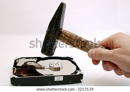 Destroying data from hard disk - conceptual photo