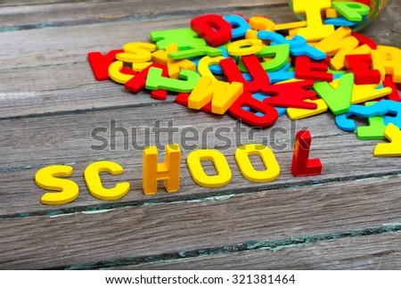 School text on wood background
