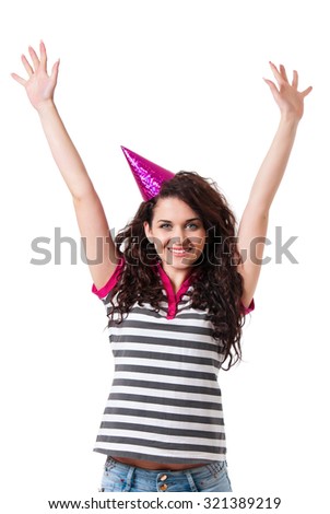 Cheerful beautiful girl in birthday cap, isolated white background