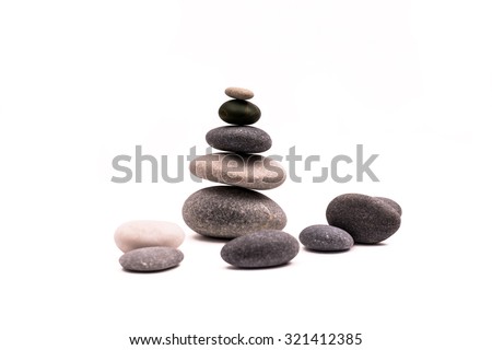 Balance stone isolated on white background. Balance Stones. Royalty-Free Stock Photo #321412385