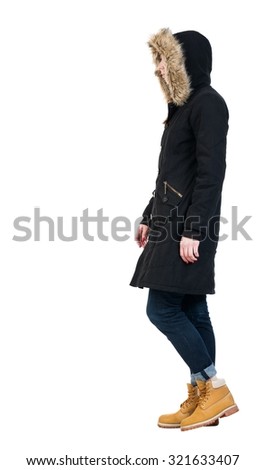 Back view of going  woman in parka. walking young girl. Rear view people collection.  backside view of person.  Isolated over white background. Past us is a girl in a winter jacket