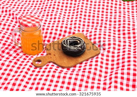 Healthy picnic for a summer vacation with freshly baked donuts, 