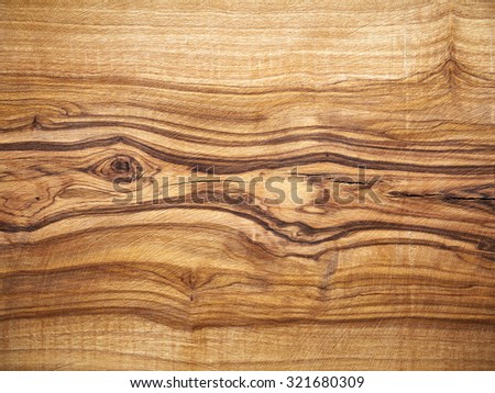 Wooden background, olive wood, wood grain Royalty-Free Stock Photo #321680309