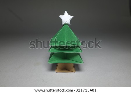 Origami in shape of Christmas Tree with star on top