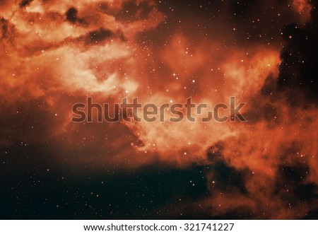 Stars in the night sky orange background.