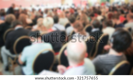Crowd at entertainment show generic background, intentionally blurred post production.