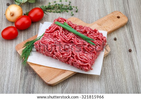 Raw minced beef meat with green oinion and dill