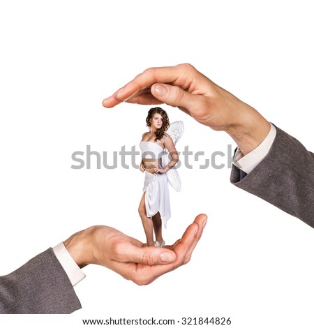 Hands holding woman between palms over white background