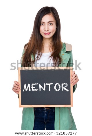 Woman hold with blackboard showing a word mentor