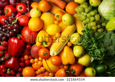 Colorful fruits and vegetables background Royalty-Free Stock Photo #321864554