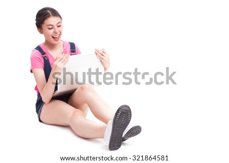 Young asian woman using a computer on white background