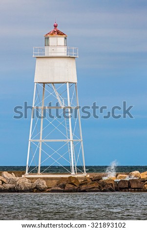 The Grand Marais Rear Range Light shines it beacon to aid vessels entering the harbor of the small town on Upper Peninsula Michigan's Lake Superior coast.