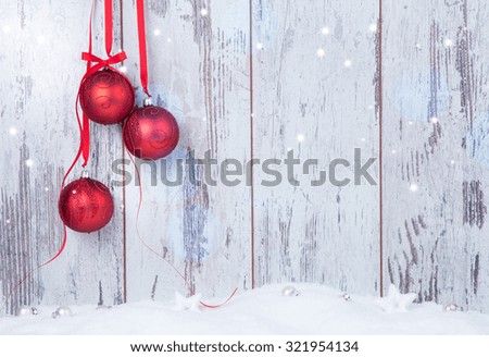 Christmas background, red balls snow and snowflakes, free space for text. Christmas decoration. 