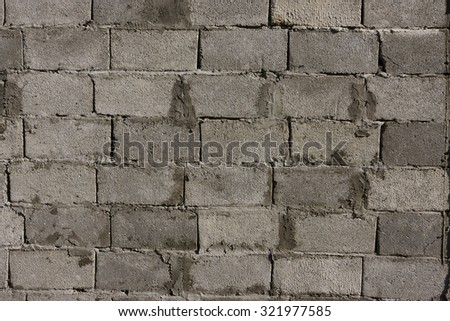 wall of gray brick