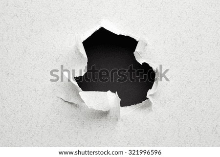 Hole in paper. Abstract background