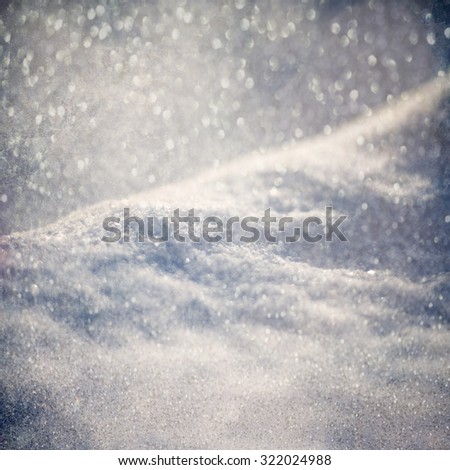 Winter background - Abstract bokeh lights and snowdrift