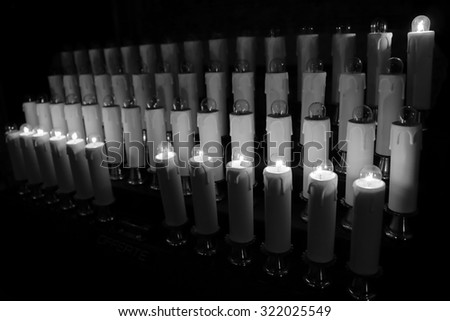 Rome, Italy. Electrical candles with incandescent lamps in basilica