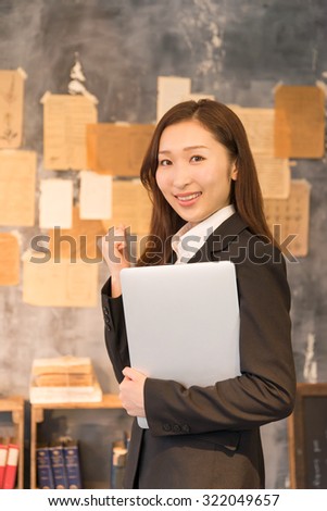asian young woman with laptop