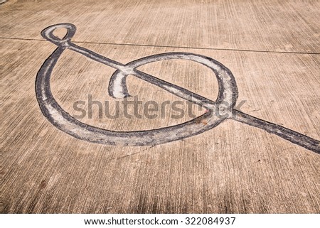 Musical notes creatively drawn on a road.