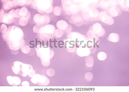 Abstract purple bokeh light background
