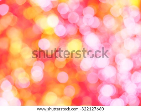Abstract colorful photo of light  and glitter bokeh lights background. Image is blurred and made with colorful filters.
