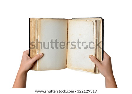 Open old blank book in hands isolated on white background