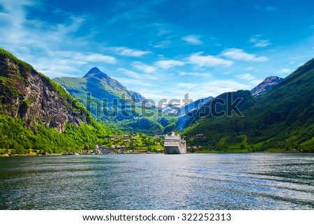 cruise ship in norway fjord Royalty-Free Stock Photo #322252313