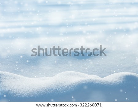 Natural winter background with snow drifts and falling snow Royalty-Free Stock Photo #322260071