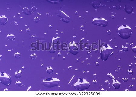 Raindrops on car surface