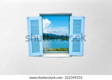 Nature view greek style window on white concrete wall color 