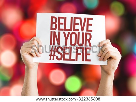 Believe In Your #Selfie placard with bokeh background