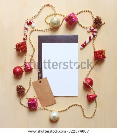 Blank greeting card and tag mock up with christmas ornament, retro filter effect