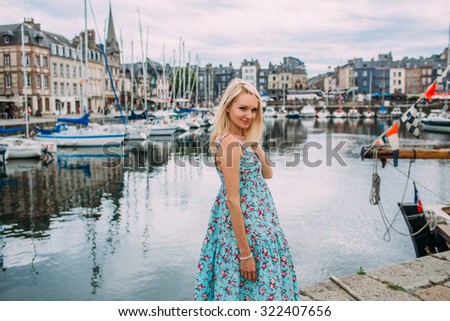 beautiful woman on the waterfront in Honfleur