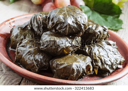 Traditional Armenian dolma (tolma) - stuffed with meat in grape leaves, selective focus