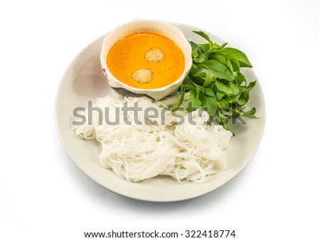 Thai vermicelli eaten with curry Royalty-Free Stock Photo #322418774