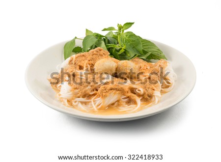 Thai vermicelli eaten with curry Royalty-Free Stock Photo #322418933