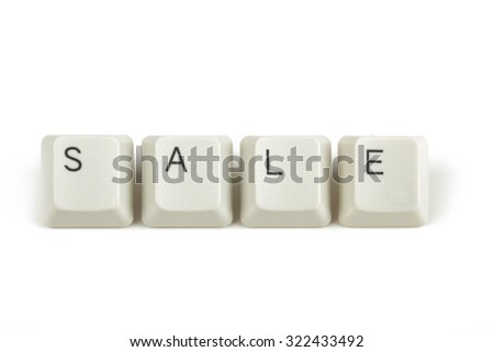 sale text from scattered keyboard keys isolated on white background