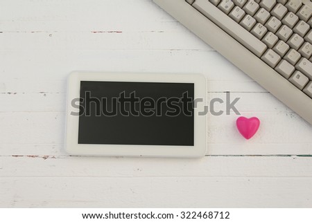Keyboard and tablet computer on white background