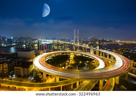 Bird view of Shanghai Nanpu Bridge,a spiral bridge at night,China