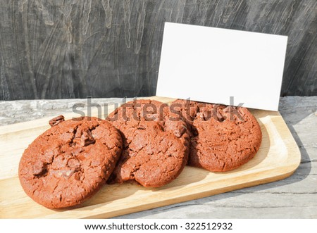 Homemade chocolate cookies with blank name card, stock photo