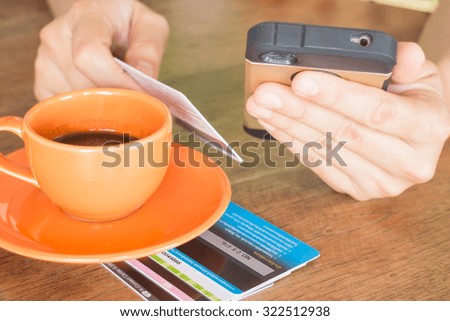 Hand holding smart phone online business, stock photo