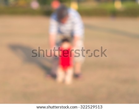 Blur picture, Parents teach their children to learn to walk
