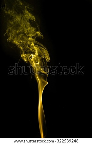 movement of yellow smoke, Abstract gold smoke on black background, gold background,gold ink background