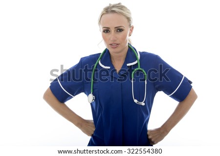 Attractive Young Blonde Caucasian Woman Posing As A Doctor Or Nurse, In A Blue Hospital Uniform, With A Stethoscope, Isolated On White, Smiling And Confident