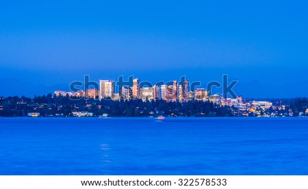 view of the dock in lake Washington with back ground skyline of Bellevue  from Lake Washington,Usa.